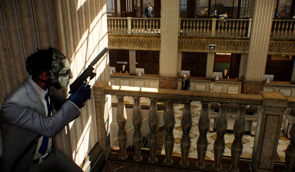 Payday 2 - A criminal in a suit takes cover in the upstairs of a large bank.